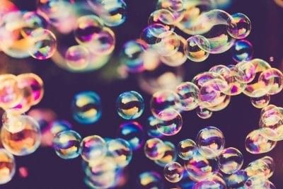 soap bubbles are floating in the air