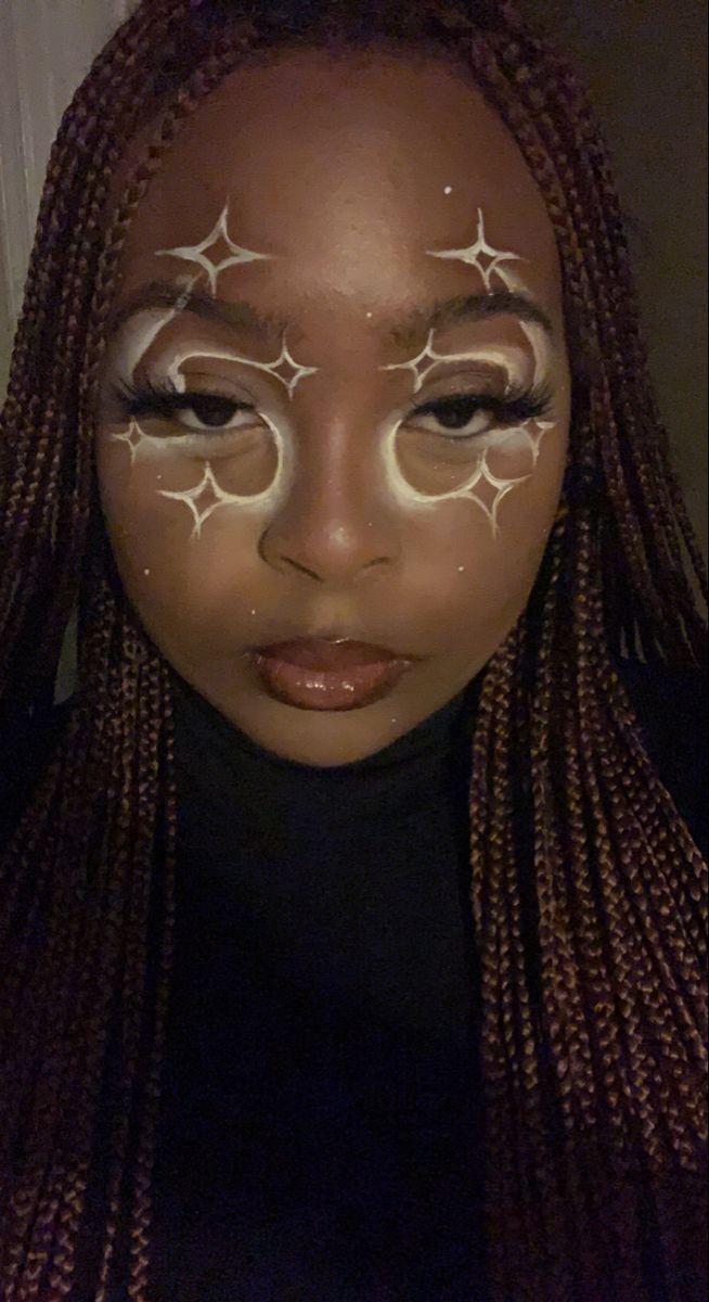 Whole Face Makeup Ideas, Easy Unique Eyeliner, Crescent Moon Makeup, Artsy Eyeliner Black, Extra Eyes Makeup, Ateez Inspired Makeup Looks, Star Around Eye Makeup, White Makeup Black Women, Hooded Lid Eyeliner