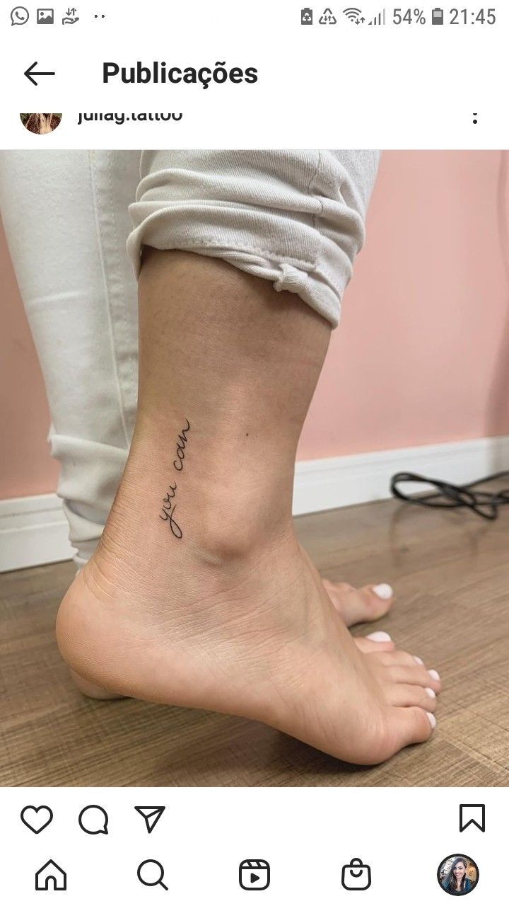 a woman's foot with the words, i love you in cursive writing