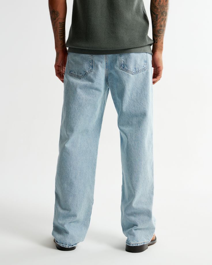 Our new baggy jeans, that are relaxed and baggy-fitting through the leg with slight puddle at the shoe, in our 100% cotton no-stretch fabric and broken-in denim feel. Features a vintage light wash and clean hem. Features a longer inseam designed to puddle around the shoe. For a shorter visual, choose a shorter inseam. Light Wash Relaxed Fit Cargo Jeans With Five Pockets, Casual Rigid Denim Straight Fit Bottoms, Casual Rigid Denim Bottoms With Straight Fit, Casual Straight Fit Rigid Denim Bottoms, Relaxed Fit Cotton Cargo Jeans For Everyday, Casual Rigid Denim Pants With Standard Cut Leg, Everyday Relaxed Fit Cargo Jeans In Rigid Denim, Relaxed Fit Straight Leg Cargo Jeans For Everyday, Casual Relaxed Fit Jeans With Standard Cut Leg