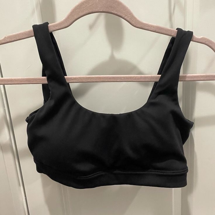 Gently Worn And Brand New Condition Black Sports Swimwear With Built-in Bra, Black Seamless Swimwear For Workout, Seamless Black Swimwear For Workout, Black Seamless Athletic Swimwear, Fitted Black Sports Bra For Loungewear, Black Seamless Sports Bra For Loungewear, Black Sporty Swimming Activewear, Black Athleisure Sports Bra For Loungewear, Black Athleisure Swimwear For Training