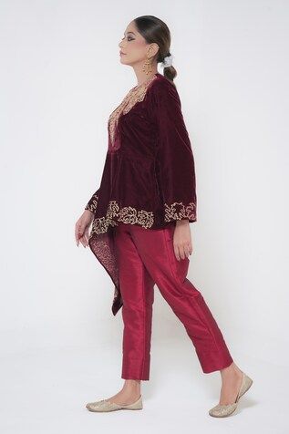 Maroon full sleeves cross cut tunic crafted in velvet with kashmiri bloom golden tilla embroidery detail. Paired with a straight silk pant. - Aza Fashions Long Sleeve Kaftan With Dabka Work For Reception, Wedding Velvet Long Sleeve Bandhgala, Eid Velvet Fitted Bandhgala, Festive Velvet Bandhgala With Long Sleeves, Velvet Bandhgala For Eid Festivities, Velvet Long Sleeve Kurta For Party, Fitted Velvet Bandhgala For Eid, Velvet Long Sleeve Party Kurta, Festive Long Sleeve Velvet Bandhgala