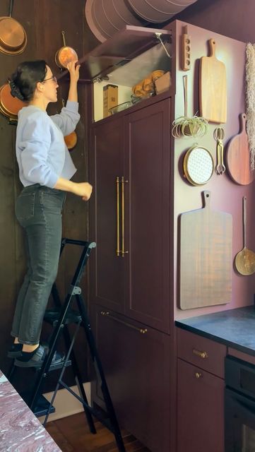 Renee Bruner | solo diy home renovation 💪🏼 on Instagram: "DIY CABINET ORGANIZATION ✨

I think my favorite feature is the hidden microwave! Fun fact: I designed and built the island’s cabinet depth around the dimensions of the tiniest microwave I could find 😆

PS: We’re kicking off Kitchen Week! I’m sharing all of the hidden details and tips from my DIY kitchen renovation… and then I’ll reveal my next big project! 😉" Green Interior Paint Colors, Hidden Appliances, Green Interior Paint, Hidden Microwave, Dark Green Interior, Cabinet Trash, Cabinet Depth, Replacing Countertops, Spice Organization Drawer