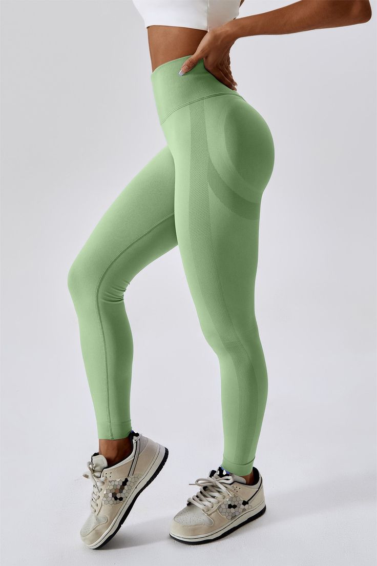 Our high-waisted design offers a seamless, supportive fit that hugs your body. These Butt-Sculpting leggings feature contouring and sculpted panels at the rear, ensuring you both look and feel fantastic during your workout sessions. Elevate your fitness fashion with these must-have leggings! Features: High waisted fit Ruching at the rear Supportive ribbed waistband Bum sculpting to accentuate the glutes Squat proof Fabric: Seamless knit fabric Skin-friendly Four-way stretch Breathable Quick-dryi Compressive Seamless Sportswear Leggings, Compression Seamless Leggings For Yoga, High Stretch Seamless Leggings For Pilates, High Stretch Seamless Leggings, High Stretch Seamless Leggings For Athleisure, Compressive Seamless Leggings For Gym, Compression Seamless Sportswear Leggings, Compressive Seamless Leggings For Pilates, Compression Seamless Fabric Leggings For Sportswear