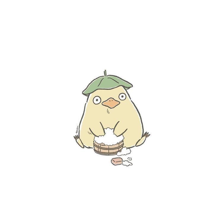 a small bird with a green hat on its head sitting in front of a white background