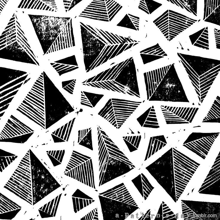 an abstract black and white background with many different shapes in the same pattern on it