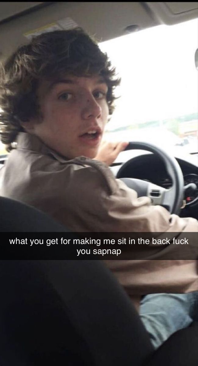 a young man driving a car with the caption what you get for making me sit in the back seat