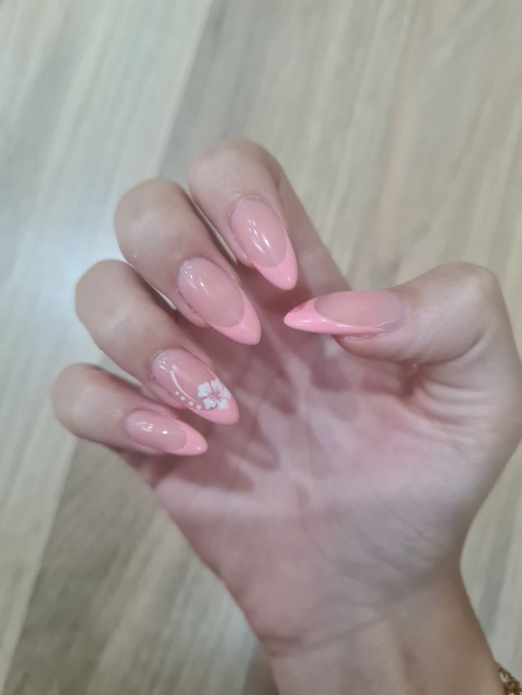 Light Pink Acrylic Nails With Flower, Nail Designs Spring Almond Shape, Almond Nails White French Tip Design, Almond Nails Hawaii Flowers, French Tip Summer Nails Almond, Pink Summer French Tip Nails, French Tip Hibiscus Almond Nails, Baby Pink Almond Nails Design, Pink French Hibiscus Nails