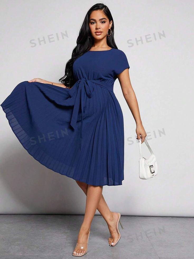 Type:A Line \nSleeve Type:Batwing Sleeve \nStyle:Elegant \nDetails:Belted \nWaist Line:High Waist \nDetails:Pleated \nHem Shaped:Pleated \nNeckline:Round Neck \nColor:Blue \nPattern Type:Plain \nSleeve Length:Short Sleeve \nLength:Knee Length \nFit Type:Loose \nFabric:Non-Stretch \nMaterial:Woven Fabric \nComposition:100% Polyester \nCare Instructions:Machine wash or professional dry clean \nBelt:Yes \nSheer:No \nSpecial Features:Recycled Material \n Shein Maternity, Batwing Sleeve, Belted Dress, Maternity Dresses, Maternity Clothes, Dress P, Knee Length, Round Neck, Dry Clean