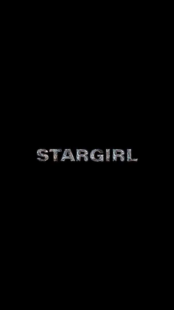 the word stargirl written in silver on a black background