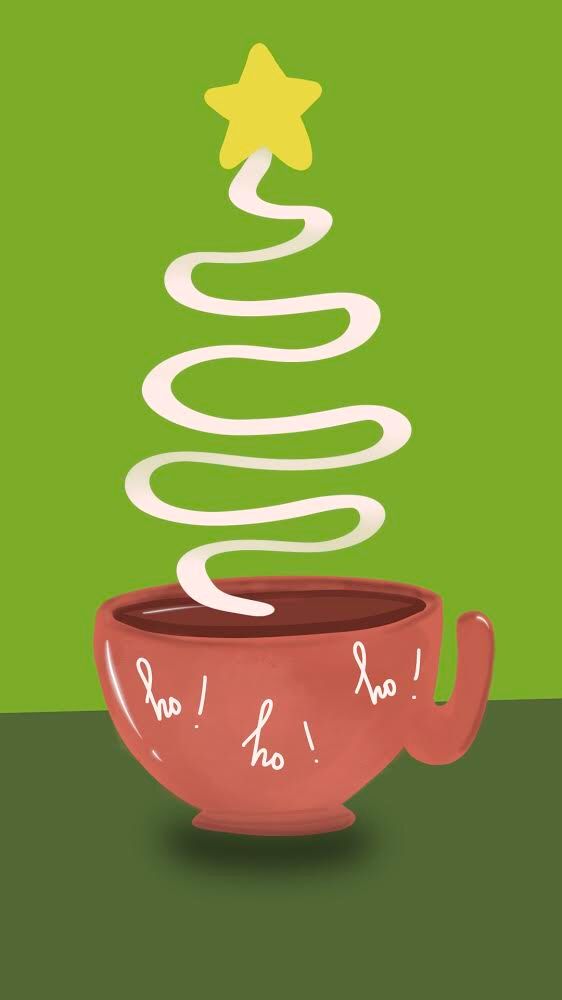 a red bowl filled with hot chocolate sitting on top of a green table next to a yellow star