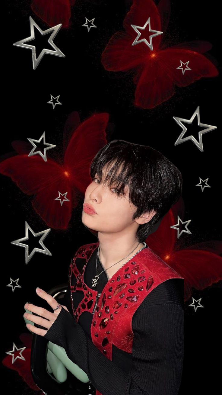 a woman with black hair and red shirt standing in front of star shaped stars on a black background