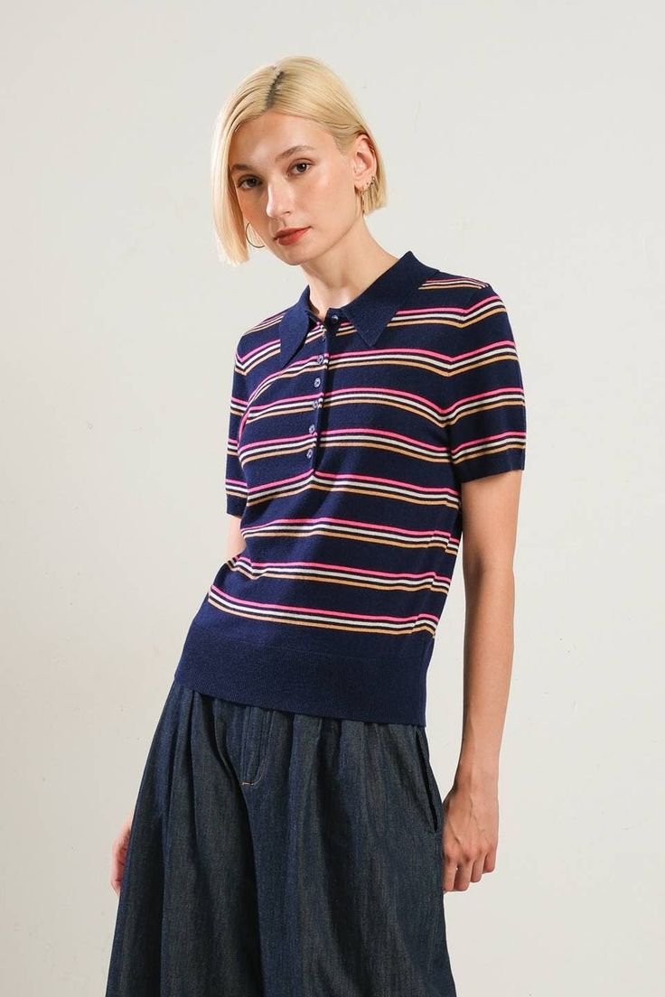 The Elsie Top will be a stylish and versatile addition to your wardrobe. This striped polo shirt features a classic collar, front button down placket, and short sleeves. 54% Polyester, 20% Acrylic, 20% Nylon, 6% Wool // Hand wash cold // Made in China