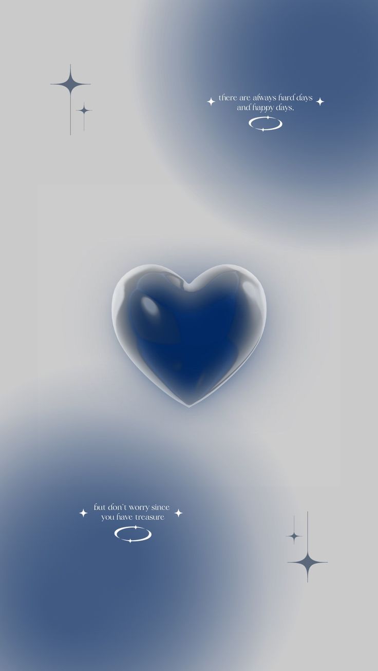 a blue heart is floating in the air