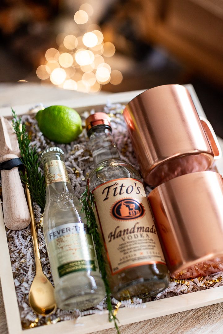 an assortment of alcohol and condiments on a tray