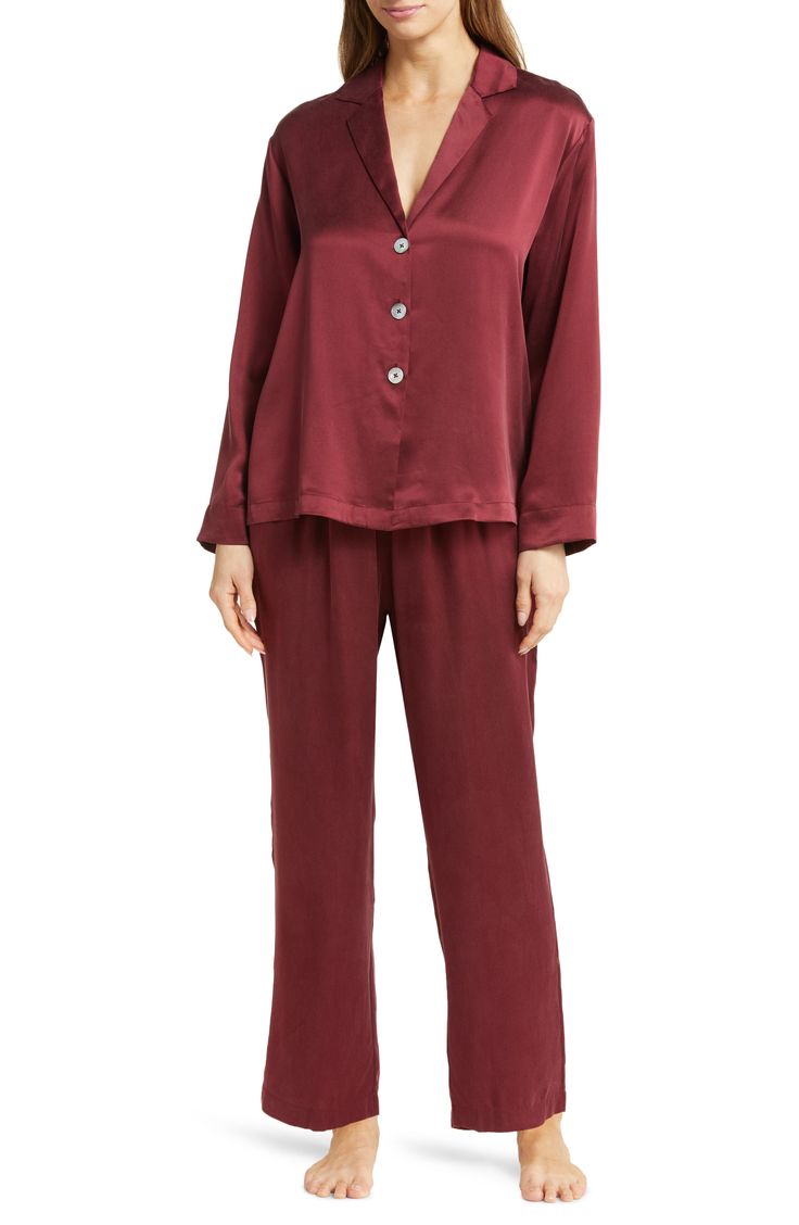 Sleep cool and comfy all year round in these pajamas fashioned from thermoregulating silk in a relaxed fit with luminous shell buttons. 25 1/2" top center front length; 28" inseam;, 17" leg opening; 12" front rise; 15 1/2" back rise (size Medium) Top has notched collar; long sleeves Bottoms have elastic waist 100% silk Machine or hand wash, dry flat Imported Long Sleeve Pajamas, Pajama Fashion, Sleep Wear, Shell Buttons, Silk Pajamas, Notched Collar, Elastic Waist, Pajamas, Hand Wash