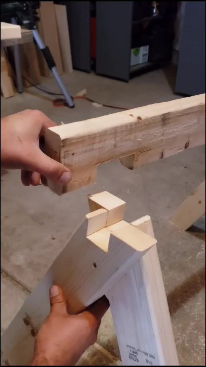 someone is working on something with wood