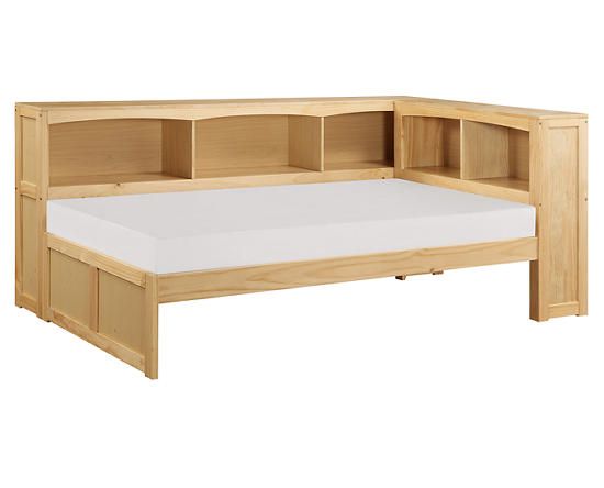 a wooden bed frame with built in bookshelves on the top and bottom sides