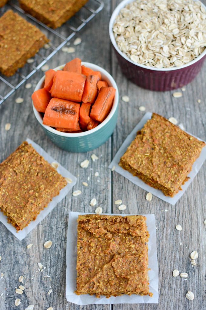 carrots, oats and crackers are sitting on the table next to each other