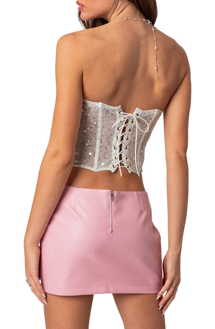 Take your night-out look to the next level with this strapless corset crop top covered in dazzling sequins and finished with a lace-up back closure. Lace-up back closure Sweetheart neck Strapless Semisheer Lined bodice 95% polyester, 5% spandex Hand wash, dry flat Imported Party Crop Top With Boned Bodice, Glamorous Strapless Crop Top For Parties, Summer Party Lace Corset, Glamorous Strapless Corset For Party Season, Strapless Sequined Party Crop Top, Glamorous Bandeau Sequin Crop Top, Strapless Sequined Crop Top For Party, Strapless Corset Back Crop Top For Night Out, Strapless Sequined Crop Top For Summer