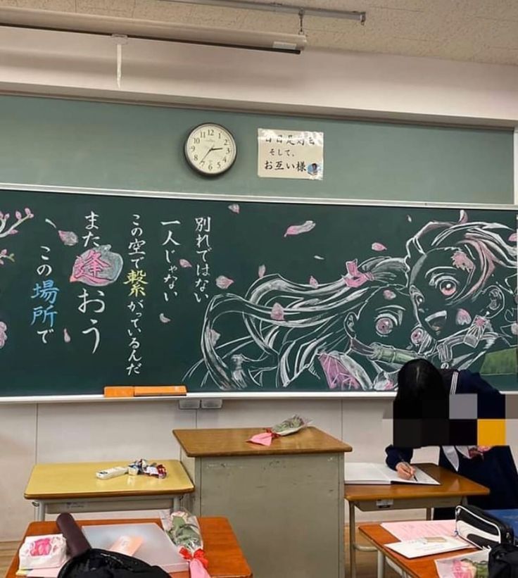 an empty classroom with desks and a chalkboard on the wall in front of it