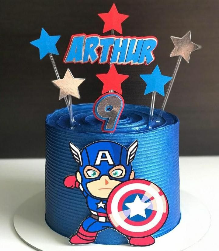 the birthday cake is decorated with captain america decorations