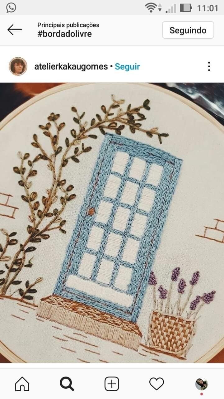 an embroidery project with a blue window on it