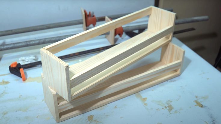 a pair of woodworking tools sitting on top of a table