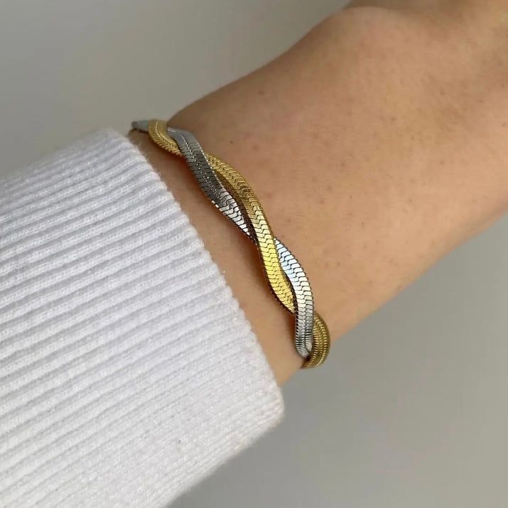 Our Eleanor Watchband Bracelet adds a trendy and timeless touch to any outfit. The perfect accessory for those looking to exude girl boss vibes. Made with high-quality materials for durability and style. Elevate your look and make a statement with this must-have piece. 316L Stainless Steel 18K PVD Gold Plated 6.5 inches long +2" inches ext/ 7mm wide Trendy Gold Cuff Bracelet For Fashion, Trendy Stainless Steel Chain Bracelet As Gift, Trendy Metal Bracelets Tarnish Resistant, Trendy Stainless Steel Chain Bracelet Gift, Trendy Metal Bracelets With Tarnish Resistance, Trendy Stainless Steel Bangle Bracelet, Trendy Adjustable Braided Bangle Bracelet, Elegant Stainless Steel Braided Bracelet For Everyday, Adjustable Trendy Chain Bracelet Tarnish Resistant