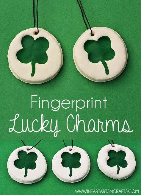 three shamrocks are hanging from the side of a green background with text that reads fingerprint lucky charms