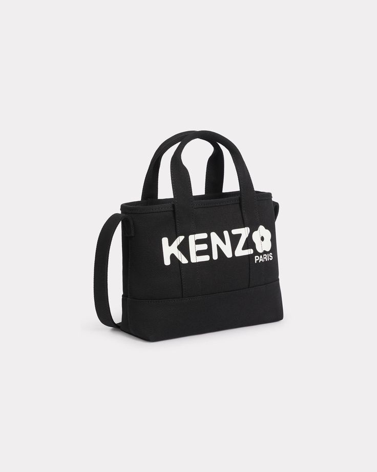 'KENZO Utility' small tote bag in canvas.2 handles.1 strap.Hook closing.1 inside card case.Printed Boke Flower 2.0 logo on the front.Carried as a crossbody bag or hand-carried. Designer Canvas Bag With Adjustable Strap, Designer Logo Satchel For Daily Use, Designer Satchel For Daily Use With Logo, Designer Canvas Bags For On-the-go, Designer Satchel With Logo For Daily Use, Designer Canvas Crossbody Bag, Everyday Satchel With Logo And Top Handle, Modern Shoulder Bag With Logo For Errands, Medium Canvas Bag With Top Carry Handle