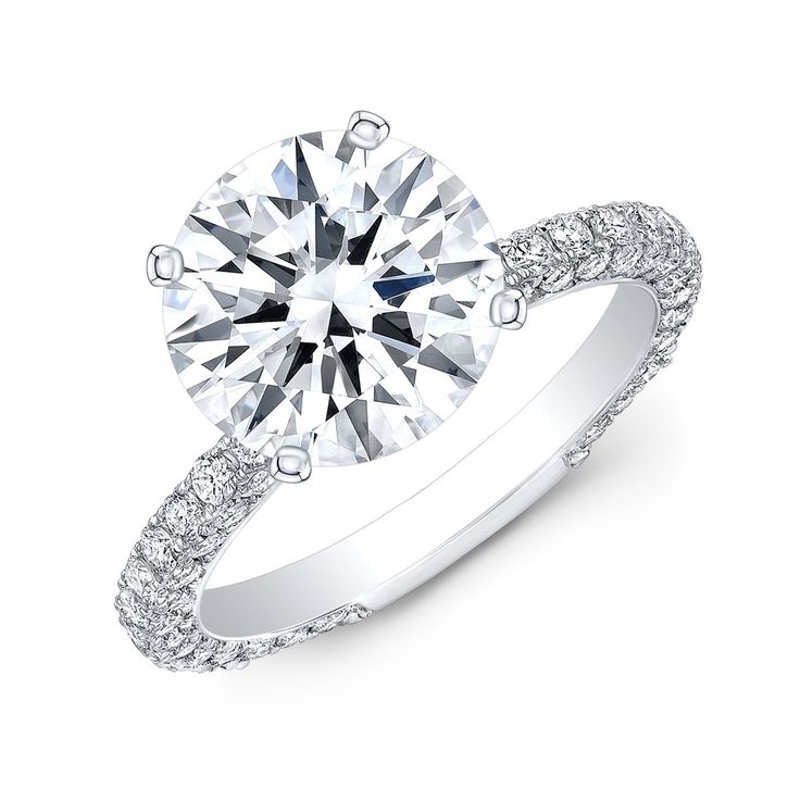 a diamond engagement ring with pave set shoulders