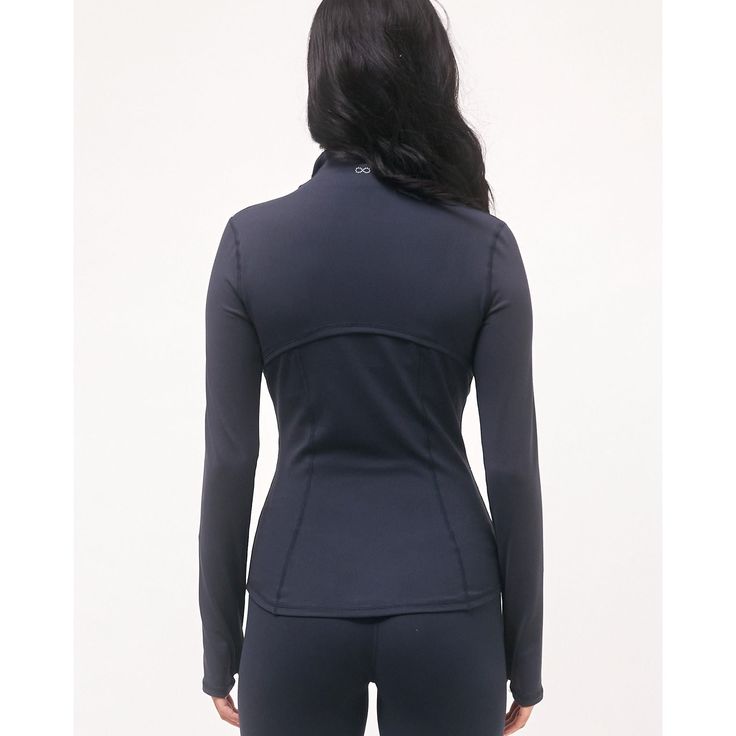 This modern tight fitted zip up Jacket is designed for the modern woman in generations X, Y, and Z. Wear it to practice, commute, quick errands, and other light activities. Features zip pockets on both sides for storage, thumbholes for coverage. Made in breathable, 4 way stretch Cloudlux fabric. Designed for yoga and on the go. 88% Nylon 12% Spandex Model is 5'7", wearing size S Fitted Outerwear With Zipper For Outdoor Activities, Fitted Athleisure Activewear With Zip Fly, Functional Sports Track Jacket With Ykk Zipper, Functional Sports Top With Zipper Closure, Sporty Fitted Outerwear For Outdoor Activities, Sports Fitted Half-zip Outerwear, Fitted Half-zip Sports Outerwear, Functional Fitted Half-zip Track Jacket, Functional Winter Outerwear With Thumbholes