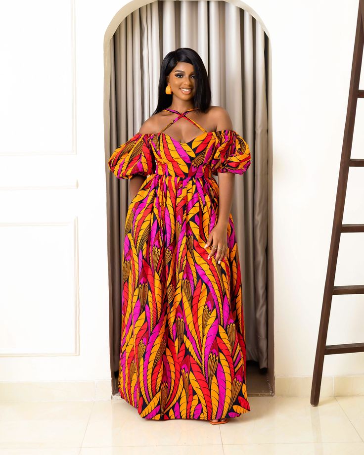 The Amaka maxi dress is a seamless blend of Afrocentric with modern style! The print and design makes it phenomenal and perfect for every occasion. Each piece is meticulously handcrafted using 100% African wax cotton ensuring the highest quality and authenticity. At our shop, we take pride in creating custom designs ta Multicolor Printed Maxi Dress In Ankara Fabric, Multicolor Printed Ankara Maxi Dress, Printed Ankara Maxi Dress, Cotton Maxi Dress With Vibrant Print, African Print Maxi Dress, You're Welcome, Jumpsuit Trousers, Couple Outfits, British Indian