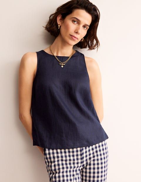 Sleeveless and crafted from breathable linen, this shell top is an easy (and stylish) way to stay cool when the temperature rises. Navy Wardrobe, Floral Tile, Superhero Fashion, Linen Top Women, Tea Shirt, Shell Top, Boden Uk, Shell Tops, Cerulean Blue