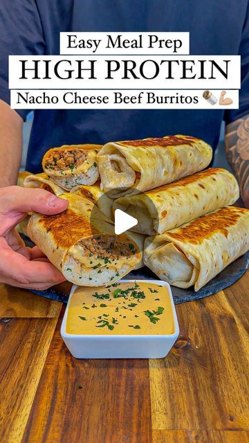 a person holding a plate with some food on it and the words easy meal prep high protein nacho cheese beef burritos