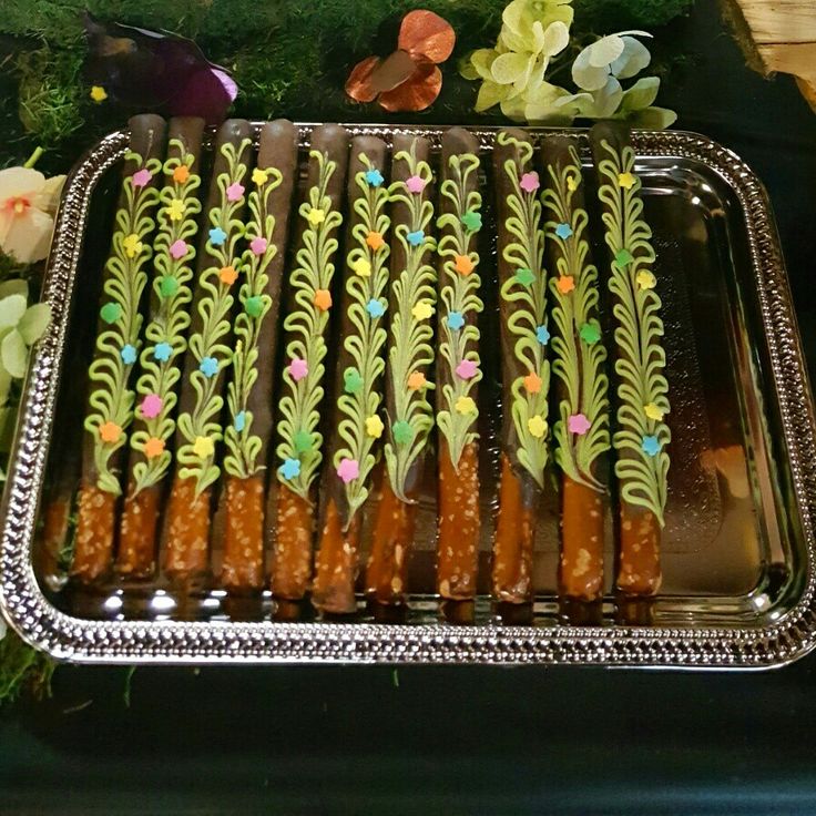 there are carrots that have been decorated with flowers