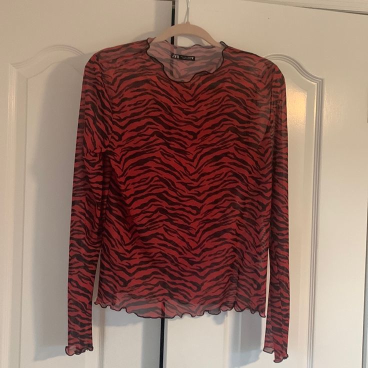 This Adorable Animal Print Top Has Scalloped Edging , Dress Up Or Down. Has Tons Of Stretch To It ***Purchased In Barcelona*** ***Never Worn ****** *****Great Buy******* Zara Printed Long Sleeve Tops, Zara Animal Print Tee, Zara Animal Print Blouse, Fluffy Sleeves, Black Long Sleeve Top With Tiger Print, Zara Tank Top, Black Long Sleeve Tiger Print Tops, Zara Printed V-neck Tops, Zara T Shirt