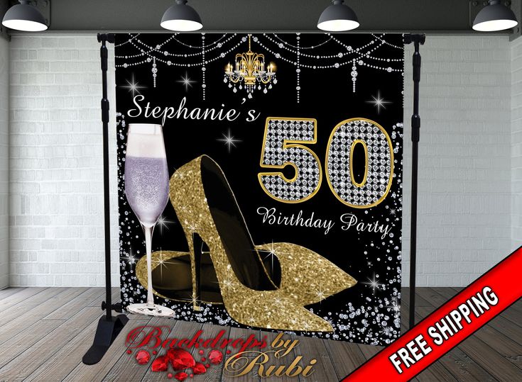 a black and gold 50th birthday party backdrop with high heel shoes, wine glass and sparkling lights