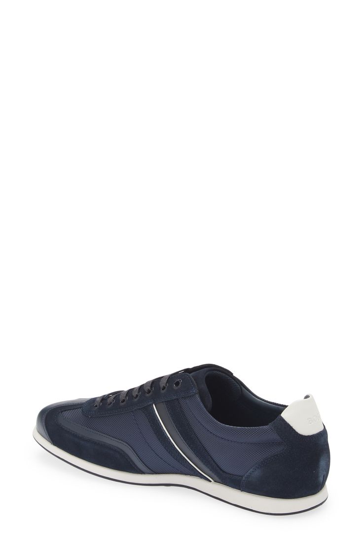 A contrasting low-top sneaker with a brand logo detail offers a refined take on sporting classic. Lace-up style   Leather upper/textile lining/rubber sole   Imported   Hugo Boss/BOSS/HUGO has received the Fair Labor Association accreditation, which signifies that the company has effective systems and procedures in place to successfully uphold fair labor standards throughout its supply chains, including strategies and tools to address and improve working conditions Classic Lace-up Sneakers With Logo, Modern Lace-up Sneakers With Logo Detail, Classic Low-top Sneakers With Logo Detail, Sporty Sneakers With Logo Detail And Round Toe, Sports Sneakers With Logo Detail, Sporty Lace-up Sneakers With Logo Detail, Sporty Sneakers With Embossed Logo And White Sole, Classic High-top Sneakers For Jogging, Classic Sports Sneakers With Embossed Logo