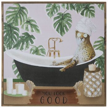 a bathroom scene with a cat in the bathtub