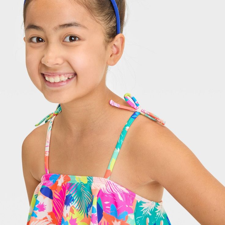 Add a standout piece to your kid's swim closet with the Mosaic Design Bikini Set from Cat & Jack™. This two-piece bikini set includes a sleeveless swim top with flounce and a pull-on swim bottom, both with mosaic print for a lovely look. Made from recycled polyester fabric with spandex and full lining, this classic-coverage bikini set offers comfort in and out of the water. Plus, the UPF 50+ rated design helps keep them shielded from the sun. Cat & Jack™: Designed for all children so you can tru Mosaic Design, Recycled Polyester Fabric, Wave Print, Mosaic Designs, Kids Outfits Girls, Kids Swimming, Summer Festival, Swim Bottoms, Pair Of Pants