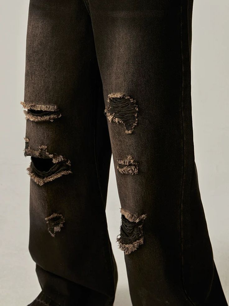 Slaying the fashion game just got easier with our Distressed Wide-Leg Charcoal Denim Jeans. These jeans are not your average pair - they boast a trendy distressed look and a wide-leg style, making them perfect for any fashion-forward individual looking to make a statement. So go ahead, show off your unique style and turn heads with our chic and edgy denim jeans! ■size(cm) Length Waist Hips S 102 72 94 M 104 76 98 L 106 80 102 XL 108 84 106 ■model 174cm 61kg L ■material 100% cotton Black Distressed Wide Leg Jeans, Black Distressed Jeans In Grunge Style, Black Distressed Grunge Jeans, Black Ripped Wide Leg Jeans, Casual Ripped Black Jeans, Distressed Baggy Flare Jeans For Fall, Trendy Baggy Distressed Flare Jeans, Fall Grunge Flare Jeans, Edgy Black Baggy Flare Jeans