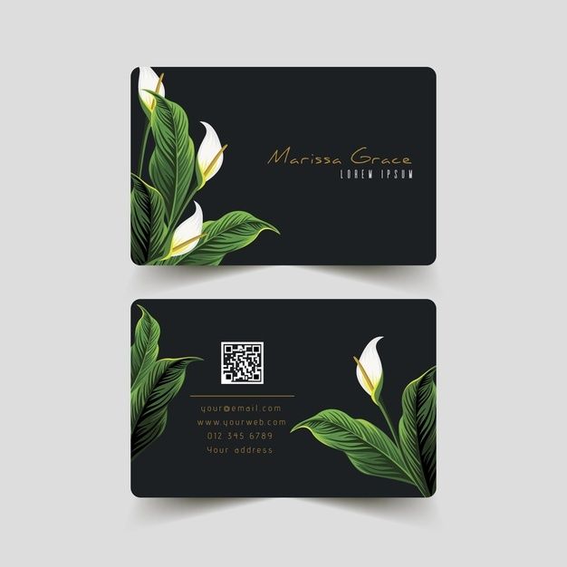 two business cards with green leaves and white flowers