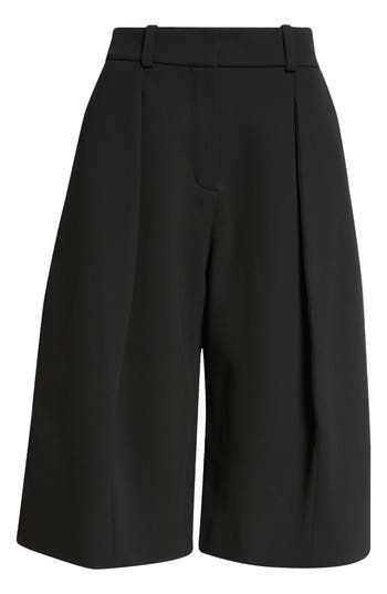 An impeccably tailored silhouette and front pleats bring the French luxury label's signature sophistication to stretch-crepe Bermuda shorts. Zip fly with button-and-hook closure Front slant pockets; back welt pocket 78% viscose, 16% polyamide, 6% elastane Dry clean or hand wash, dry flat Made in France Designer Clothing Elegant Formal Shorts With Belt Loops, Elegant Black Shorts For Office, Elegant Black Office Shorts, Elegant Bermuda Shorts For Workwear, Tailored Elegant Shorts, Chic Structured Bottoms With Pressed Crease, Black High-waisted Shorts For Formal Occasions, Elegant Tailored Shorts, Elegant Wide-leg Black Shorts