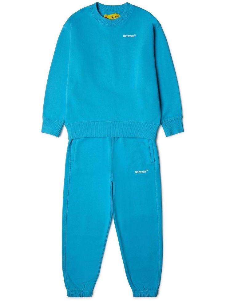 Light Blue Relaxed Fit Sweatpants For Loungewear, Blue Relaxed Fit Pants With Ribbed Cuffs, Casual Light Blue Sweatpants For Loungewear, Spring Cotton Tracksuit With Pockets, Light Blue Relaxed Fit Casual Sweatpants, Blue Sporty Sweatpants For Spring, Blue Sportswear Sweats For Loungewear, Blue Relaxed Fit Athleisure Sweats, Cotton Sweats With Logo Print For Loungewear