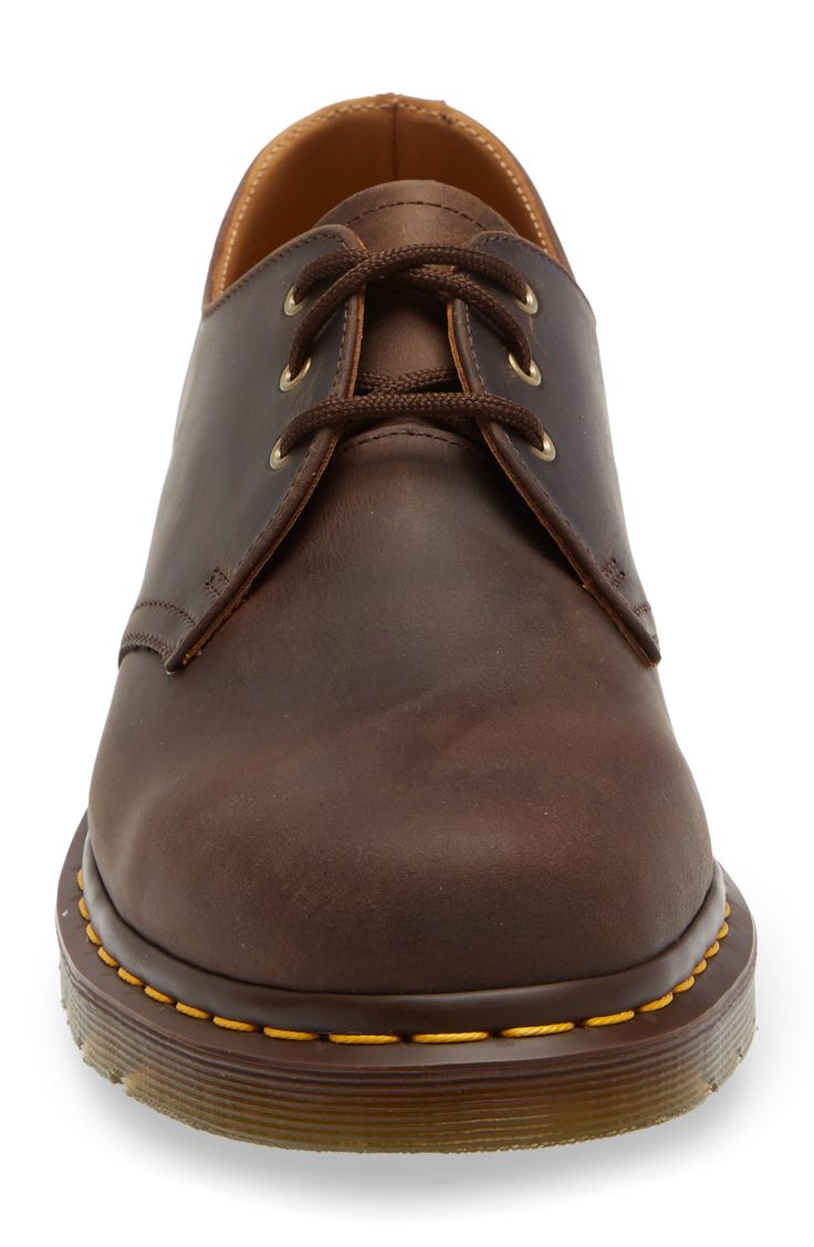 A signature sole grounds this bold derby crafted from hearty leather and fitted with air cushioning for comfort. Style Name:Dr. Martens Plain Toe Derby (Men). Style Number: 452515. Leather-lined Low-top Oxfords For Derby, Leather Oxfords For Derby In Fall, Rugged Leather Oxfords With Round Toe, Casual Leather Derby Shoes With Goodyear Welt Construction, Casual Leather Derby With Goodyear Welt Construction, Brown Leather Derby With Stitched Sole, Leather Derby Shoes With Leather Lining For Work, Leather Derby With Leather Lining For Work, Low-top Leather Lined Oxfords For Derby