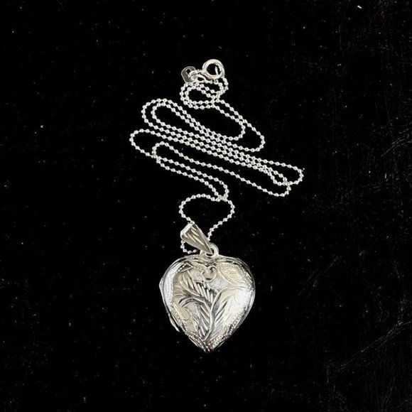 Dearest Mine | Jewelry | Sterling Silver Heart Etched Locket Necklace New | Poshmark Silver Etched Necklace For Valentine's Day, Valentine's Day Silver Etched Necklace, Adjustable Heart-shaped Engraved Necklaces, Silver Heart-shaped Etched Necklace, Etched Heart Silver Necklace, Etched Heart Pendant Necklace For Valentine's Day, Heart-shaped Etched Necklaces For Valentine's Day, Heart-shaped Etched Necklace For Keepsake, Etched Heart Necklace For Keepsake