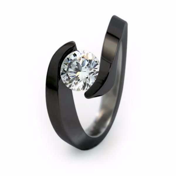 Low-profile solitaire stands out in this engagment ring stunning Black Titanium finish. Luxury Black Titanium Rings, Medieval Wedding Ring, Titanium Engagement Rings, Black Titanium Ring, Dark Rings, Titanium Jewelry, Jhumki Earrings, Titanium Ring, Aquamarine Engagement Ring