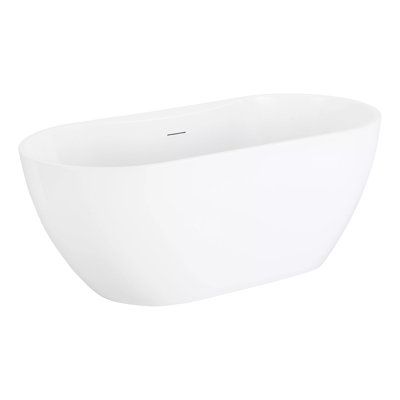 a white bathtub sitting on top of a white floor next to a wall mounted faucet